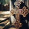 Intricate and ornate carved wooden cross, set in chapel environment