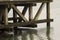 The intricate support beam structure of the viewing platform pier overlooking the Southampton Water at Hythe in Hampshire on the s