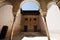 Intricately carved arches at entry to courtyard