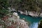 Intricately carved karst banks of the Khosta river.