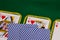 Intriguing moment in poker, closed cards on the background of open