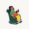 Introvert. Extraversion and introversion concept - young woman sitting in an armchair with a book and cat on her laps