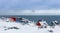 Inuit village houses covered in snow at the fjord of Nuuk city, Greenland