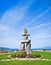 Inukshuk, symbol of the 2010 winter olympic games, with blue sky at English Bay in Vancouver, British Columbia, Canada