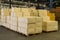 Inventory full of cardboard boxes in modern warehouse storage of retail shop