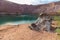 An inverted car in an old copper quarry full of water, in the hidden lake in Timna Park,