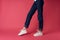 inverted female legs sneakers fashion cropped view
