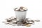 Invest money, smart finances and cash profits concept with metal coin bucket with some coins spilling around isolated on white