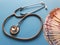 investment in health care, Brazilian money and stethoscope for medical check