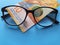 investment and promotion for a better vision, swiss banknote of ten francs and black plastic frame glasses