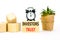 Investors trust symbol. Concept words Investors trust on wooden blocks on a beautiful white table white background. Black alarm