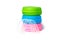 Invisible aligners for whitening and straightening of teeth with colorful green, blue and pink container box on white background.