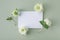 Invitation card mockup with empty paper blank decorated natural flowers top view. Minimal aesthetic template