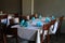 Inviting scene of table set with tableware and blue napkins