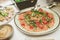 Inviting table filled with an array of delicious food items, including assorted salads in bowls