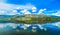 Ioannina lake Pamvotida in Epirus Region, Greece. Artistic panoramic view with natural reflection in the water