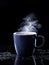 Iolite Crystal Coffee Mug on Black Background.