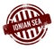 Ionian Sea - red round grunge button, stamp