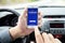 IPhone 5S app Foursquare in hands of the driver car