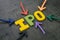 IPO, Initial Public Offering concept, colorful arrows pointing to the word IPO at the center of black cement chalkboard wall,