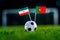 IR Iran - Portugal, Group B, Monday, 25. June, Football, World Cup, Russia 2018, National Flags on green grass, white football bal