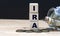 IRA - abbreviation on cubes on the background of a capacity with money
