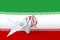 Iran flag depicted on paper origami crane wing. Handmade arts concept