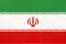 Iran national fabric flag, textile background. Symbol of world asian country