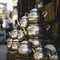 iran stack of silver kettles outside store