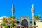 Iranian Mosque on the city street, Dubai, United Arab Emirates. Isolated on blue background