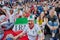 Iranian and Russian fans in fan zone at World Cup.