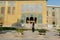 An Iranian women tourist wearing black hijab passing by Karim Khani Nook Khalvat e Karim Khani in Golestan palace, Tehran, Iran