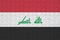 Iraq flag is depicted on a folded puzzle