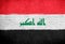 Iraq flag painted on brick wall. National country flag background photo