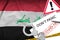 Iraq flag and police handcuffs with inscription Don`t panic on white paper. Coronavirus or 2019-nCov virus concept