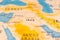 Iraq in Focus on a Tilted World Map.