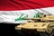 Iraq modern tank with not real design on the flag background - tank army forces concept, military 3D Illustration