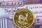 Iraqi fifty dinar note with a gold South African krugerrand