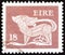 IRELAND - CIRCA 1981: A stamp printed in Ireland shows a dog from an ancient artwork, circa 1981.