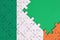 Ireland flag is depicted on a completed jigsaw puzzle with free green copy space on the right side