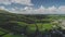 Ireland green farmlands timelapse aerial view. Greenery meadows, fields, pasture Ballycastle