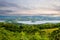 Ireland landscape. Magical Irish hills. Green island with sheep and cows on cloudy foggy day. Northern Ireland, County