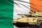 Ireland modern tank with not real design on the flag background - tank army forces concept, military 3D Illustration
