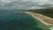 Ireland sand beach aerial view: ocean waves, sandy coastline, white shore, greenery meadow