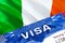 Ireland visa stamp in passport with text VISA. passport traveling abroad concept. Travel to Ireland concept - selective focus,3D