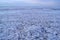 Iridescent crystals white blue ice floes with cracks glow in the light of the sun, lake baikal in winter