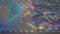 Iridescent luminous background fabric moving changing color rainbow ripples reflective reflection luminous