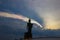 Iridescent pileus cap clouds and Buddha statue at PhutthamonthonBuddhist park in Phutthamonthon district,Nakhon Pathom Province o