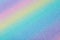 Iridescent rainbow background with glitter. Gradient texture with fine sparkles