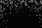 Iridescent Silver stars confetti on black festive background Glowing sparkles frame.